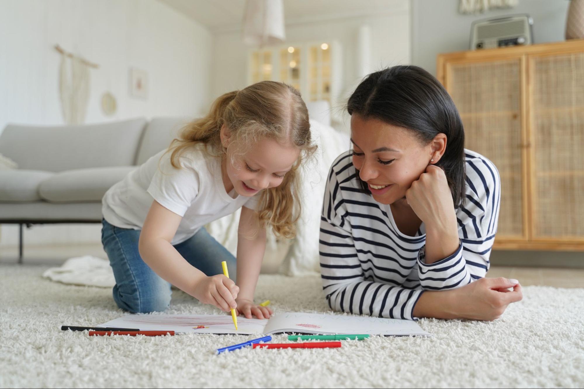Babysitter supervising a child.